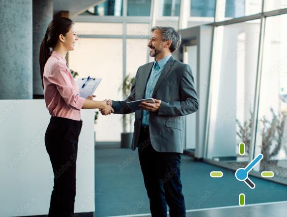 Operations manager and landlord shaking hands